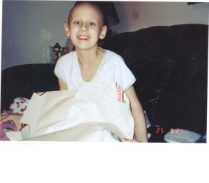 Jessica Stafford at age 8, seven months into chemotherapy treatments.